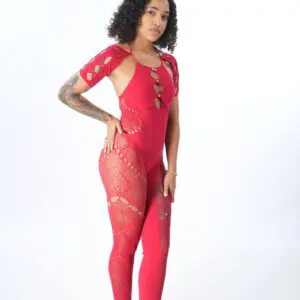 Woman posing in a vibrant red lace bodysuit against a white background.