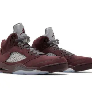 Pair of maroon and gray athletic sneakers with a modern design.