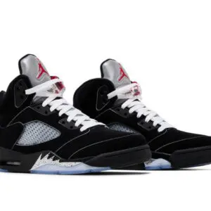 Black and white Air Jordan sneakers with red accents.