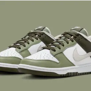 Stylish olive green and white Nike sneakers with black laces.