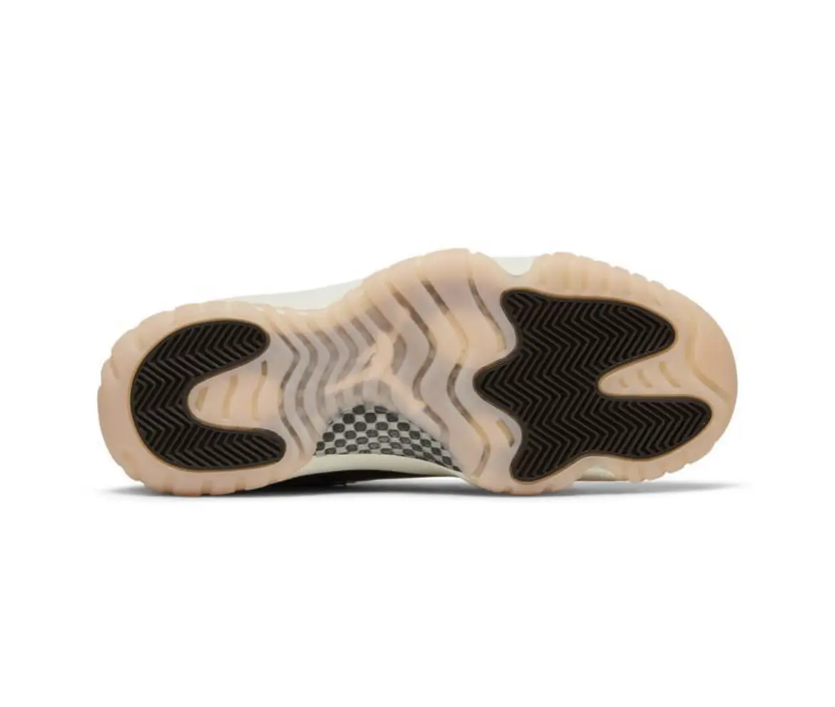 Sole of a sneaker with a unique black and beige tread pattern.