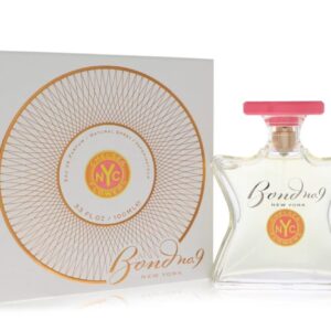 Elegant perfume bottle and matching box with a pink cap and gold accents.
